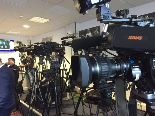 Cameras at the press conference