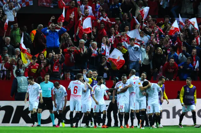 Sevilla FC players celebrate