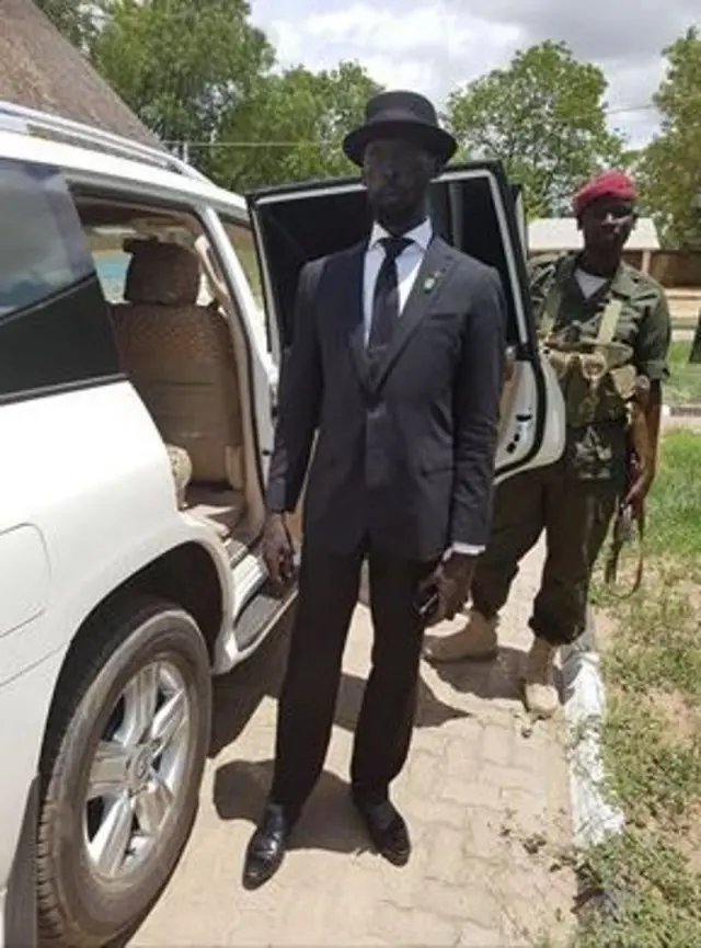 Mabior Garang wearing a tie