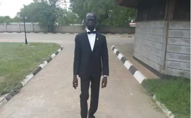 Mabior Garang wearing a bow tie