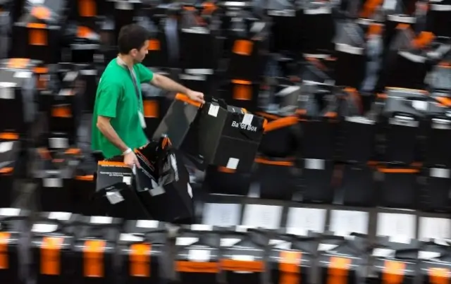 Man carrying ballot boxes