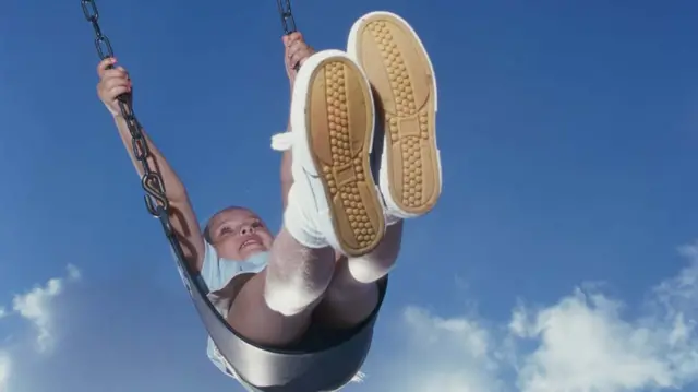 A girl on a swing