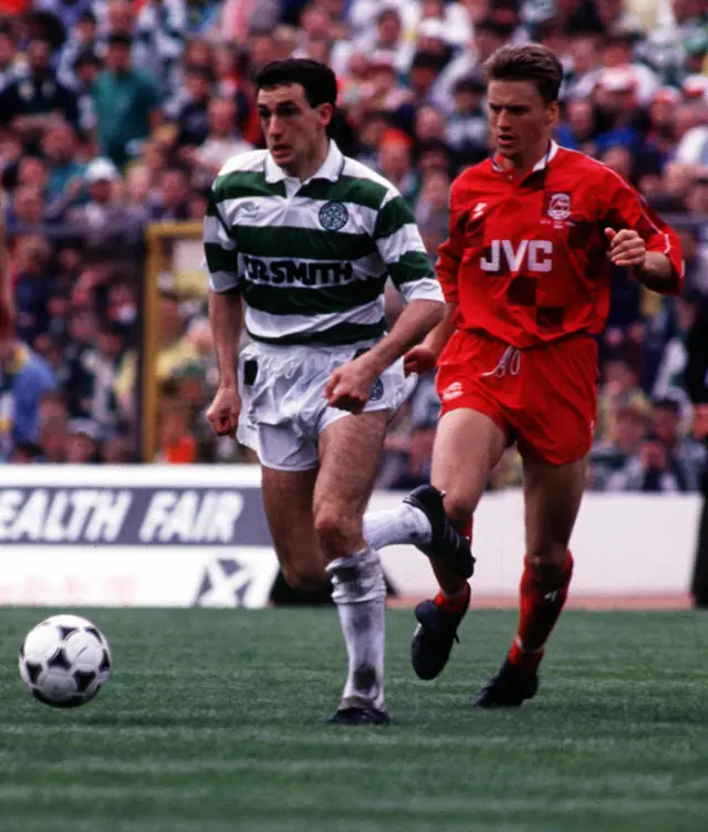 Celtic's Paul McStay (left) and Aberdeen's Brian Grant do battle in 1990