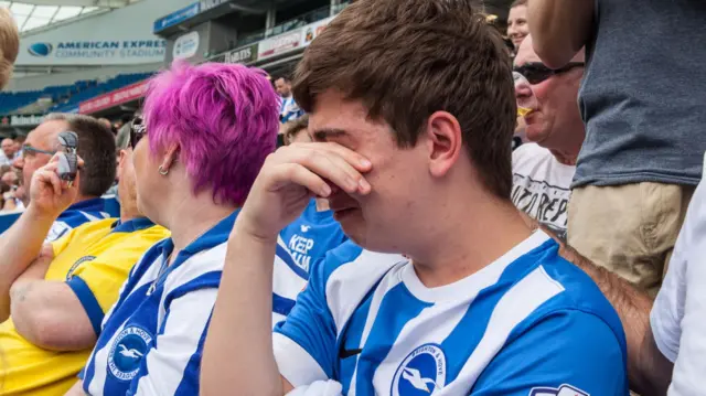 Upset Brighton fan