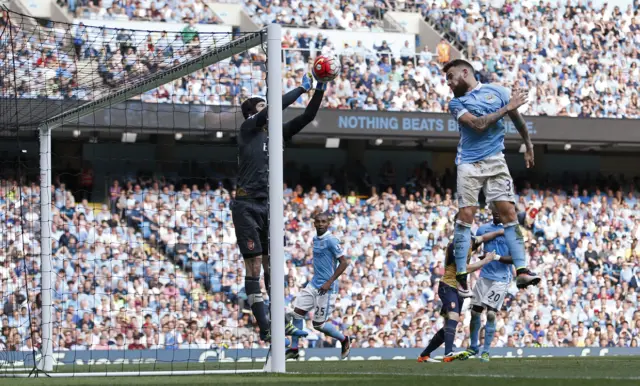 Petr Cech punches clear