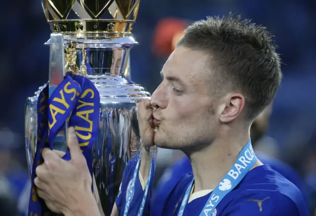 Jamie Vardy celebrates with the Premier League trophy