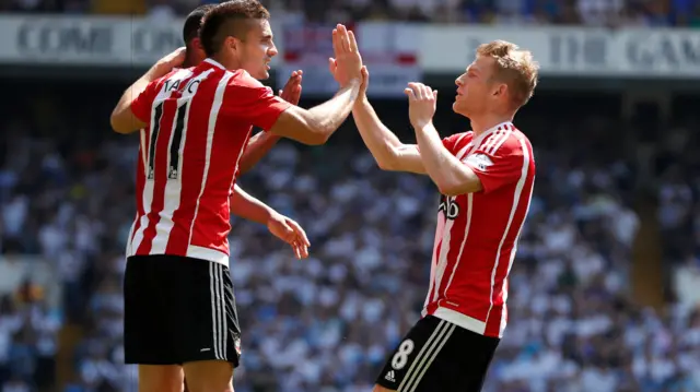 Steven Davis celebrates