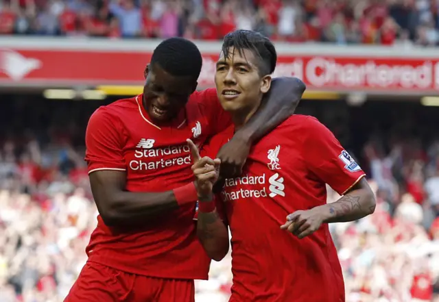 Roberto Firmino celebrates