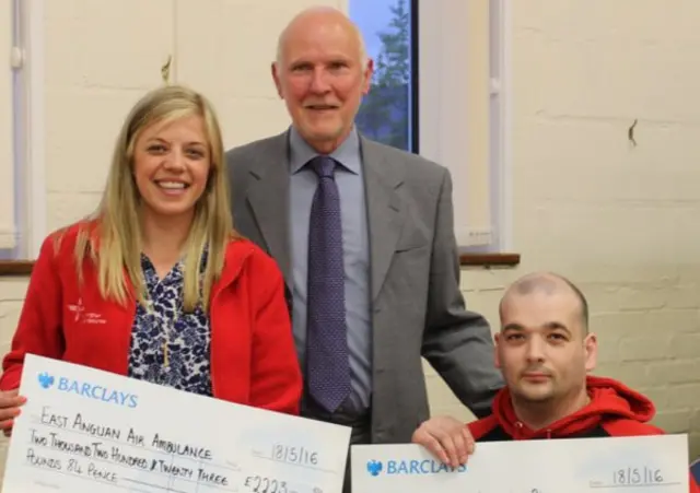 Holly Lambert from East Anglian Air Ambulance, Outgoing Mayor Cllr Julian Mason and Alan Fairchild representing the Norfolk Knights Wheelchair Rugby Club