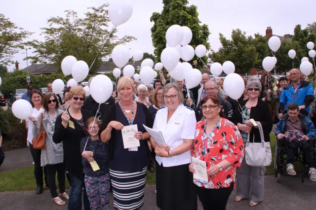 Pictured: From the left (front) is Kerry Griffiths, of RDaSH, Margaret Eaton, of the Salvation Army, and Sharon Sankey, a counsellor at RDaSH, together with some of the relatives and friends who attended the event.