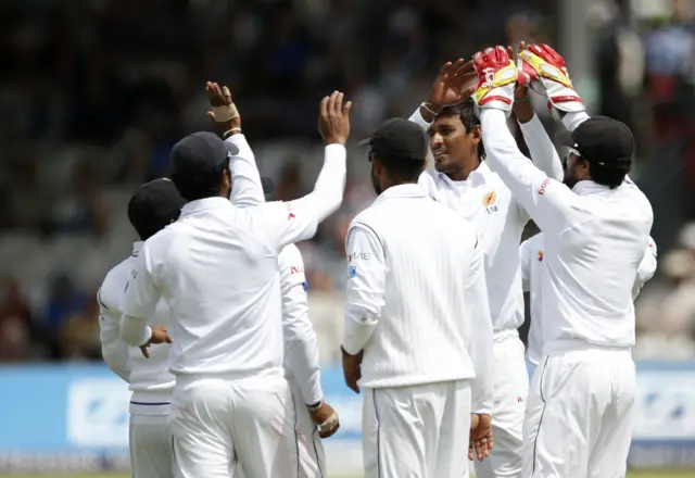 Sri Lanka's players celebrate the wicket of Stuart Broad