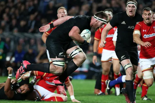 Kieran Read of New Zealand scores a try against Wales