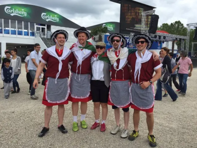 wales fans wearing Welsh lady costumes