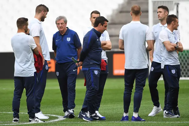 England manager Roy Hodgson and some of his players