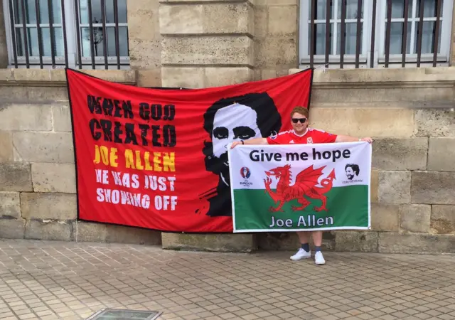 Neil Watkins with a Joe Allen flag