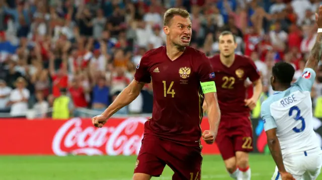 Vasili Berezutski of Russia celebrates