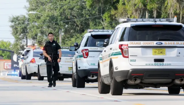 A police officer walks outside the pulse nightclub