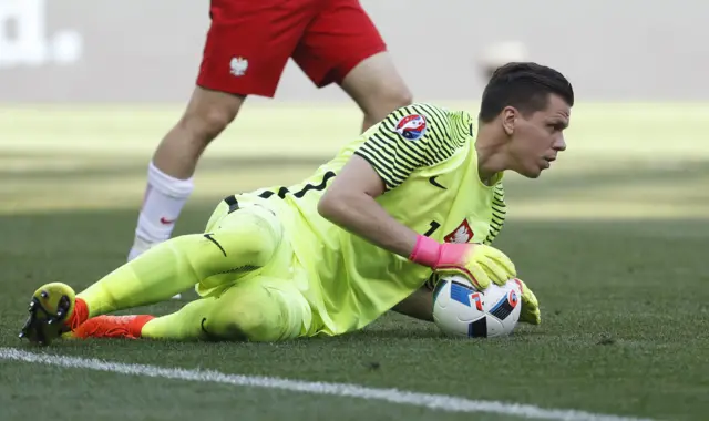 Polish keeper Wojciech Sczescny gathers the cross