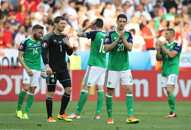 Northern Irish players look dejected at the final whistle