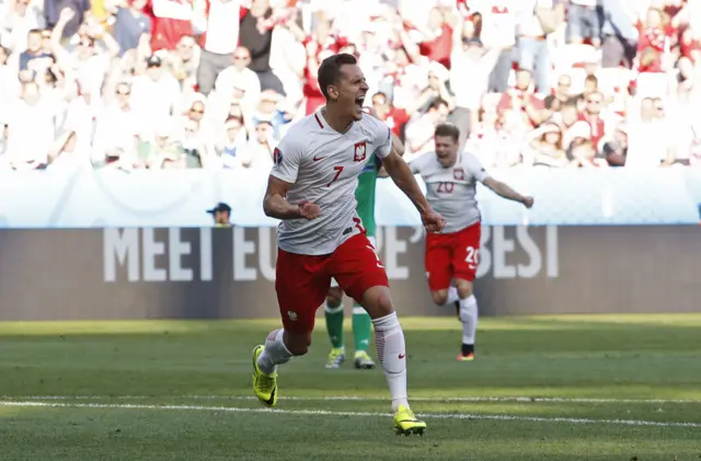 Arkadiusz Milik celebrates his goal