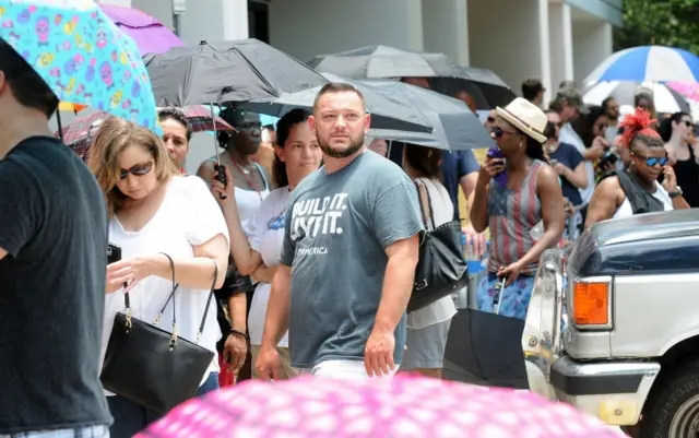 People wait in line to donate blood at the OneBlood Donation Center for the victims of a terror attack on June 12, 2016 in Orlando, Florida