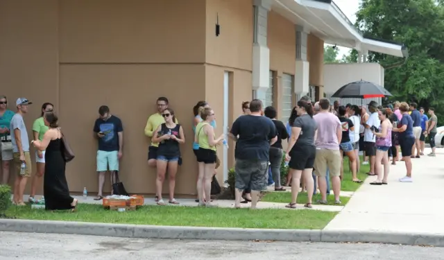 Potential blood donors line up outside the oneblood facility on Beach Blvd. In Jacksonville, Fla., Sunday, June 12, 2016.