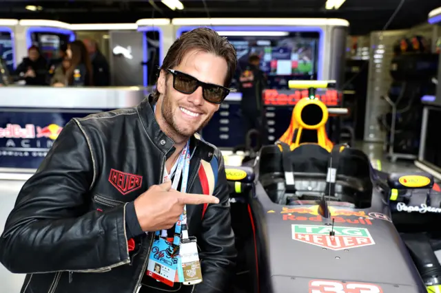 Tom Brady in the Red Bull garage