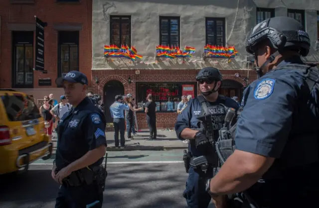 In reaction to the mass shooting at a gay nightclub in Orlando, Florida members of the NYPD Counterterrorism Unit stand outside the Stonewall Inn in New York on June 12, 2016.