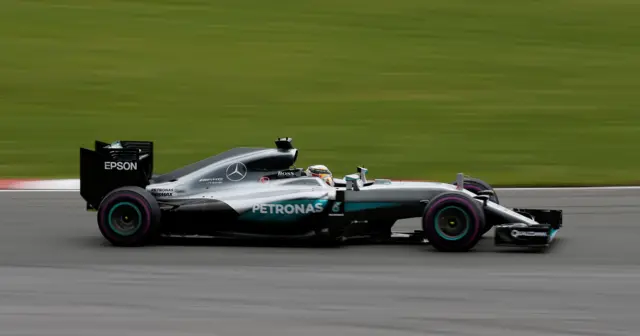 Lewis Hamilton chases down Sebastian Vettel