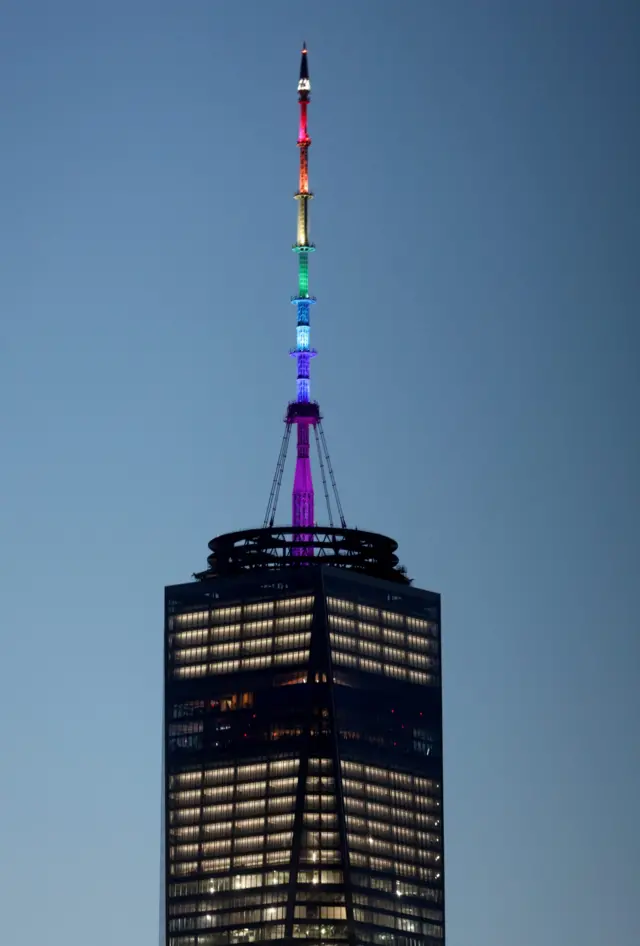 One World Trade Center in New York lit with rainbow colours