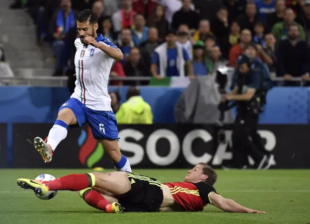 Jan Vertonghen tackles Antonio Candreva