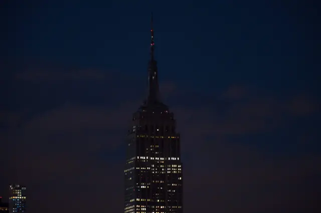 The Empire State Building goes dark in New York on June 12, 2016, in reaction to the mass shooting at a gay nightclub in Orlando, Florida,