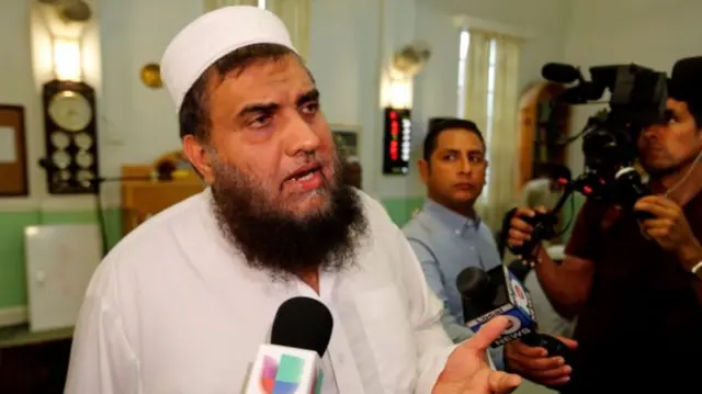 Imam Syed Shafeeq Rahman of the Islamic Center of Fort Pierce speaks with the media following a prayer for victims of the Orlando shooting, in Fort Pierce