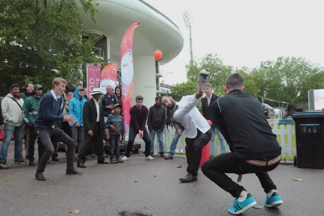 MCC staff members joins fans in a game of cricket