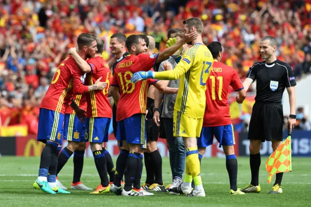 Spain players celebrate at full-time