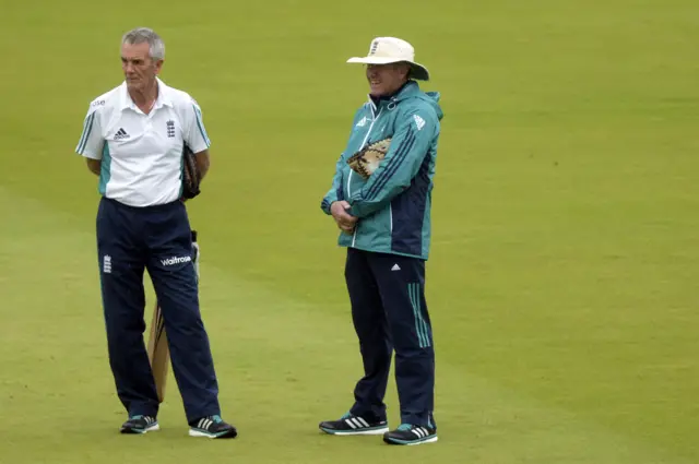 England's Phil Neal and Trevor Bayliss look-on