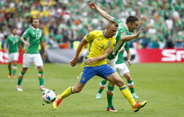 Robbie Brady chasing Sebastian Larsson