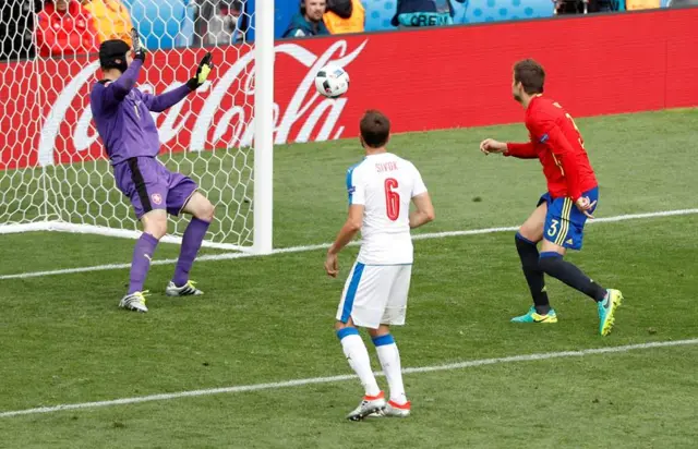 Pique heads past Cech