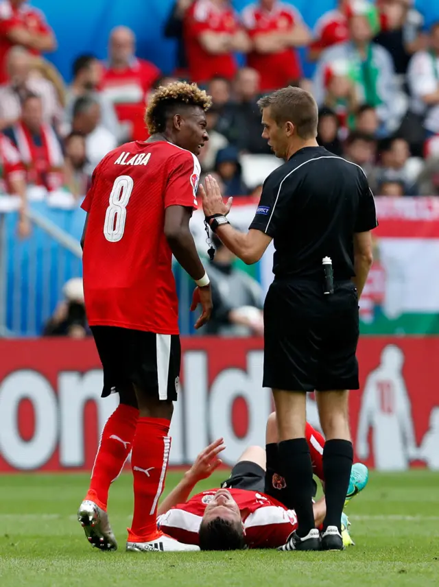 Alaba with referee