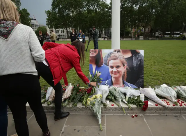 Flowers and tributes left in Parliament Square for MP Jo Cox