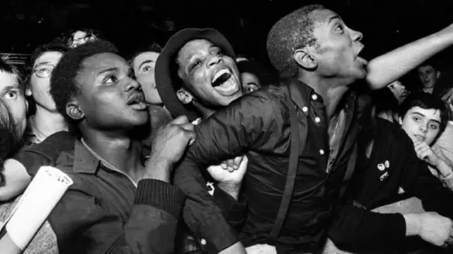 Photographer Syd Shelton captured pictures from across the UK including this image of Specials fans at Leeds' Potternewton Park in 1981