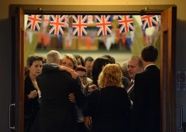 Yvette Cooper hugs the Bishop of Leeds Nick Baines