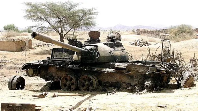 An Eritrean tank destroyed in a battle with Ethiopian troops last week sits near the strategic southwestern Eritrean town of Barentu 20 May 2000