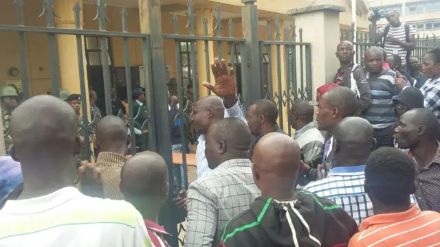 Crowds outside court gates