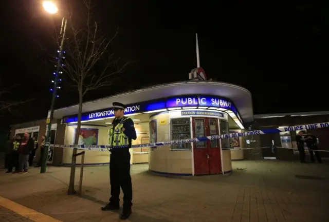 Policeman outside Leytonestone Tube station