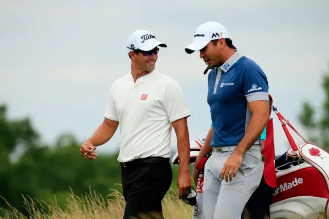 Adam Scott and Jason Day of Australia