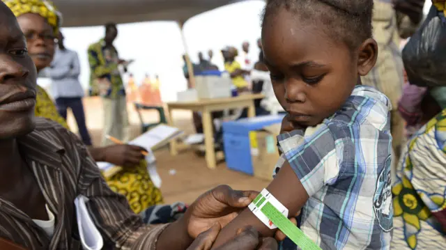 Girl getting immunised