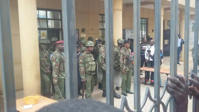 Soldiers outside the court