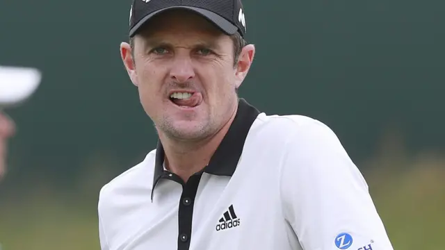 Justin Rose reacts to a missed putt