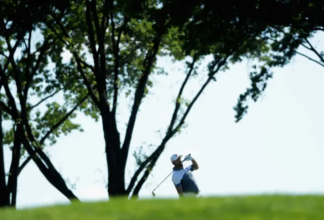 Sergio Garcia watches a shot